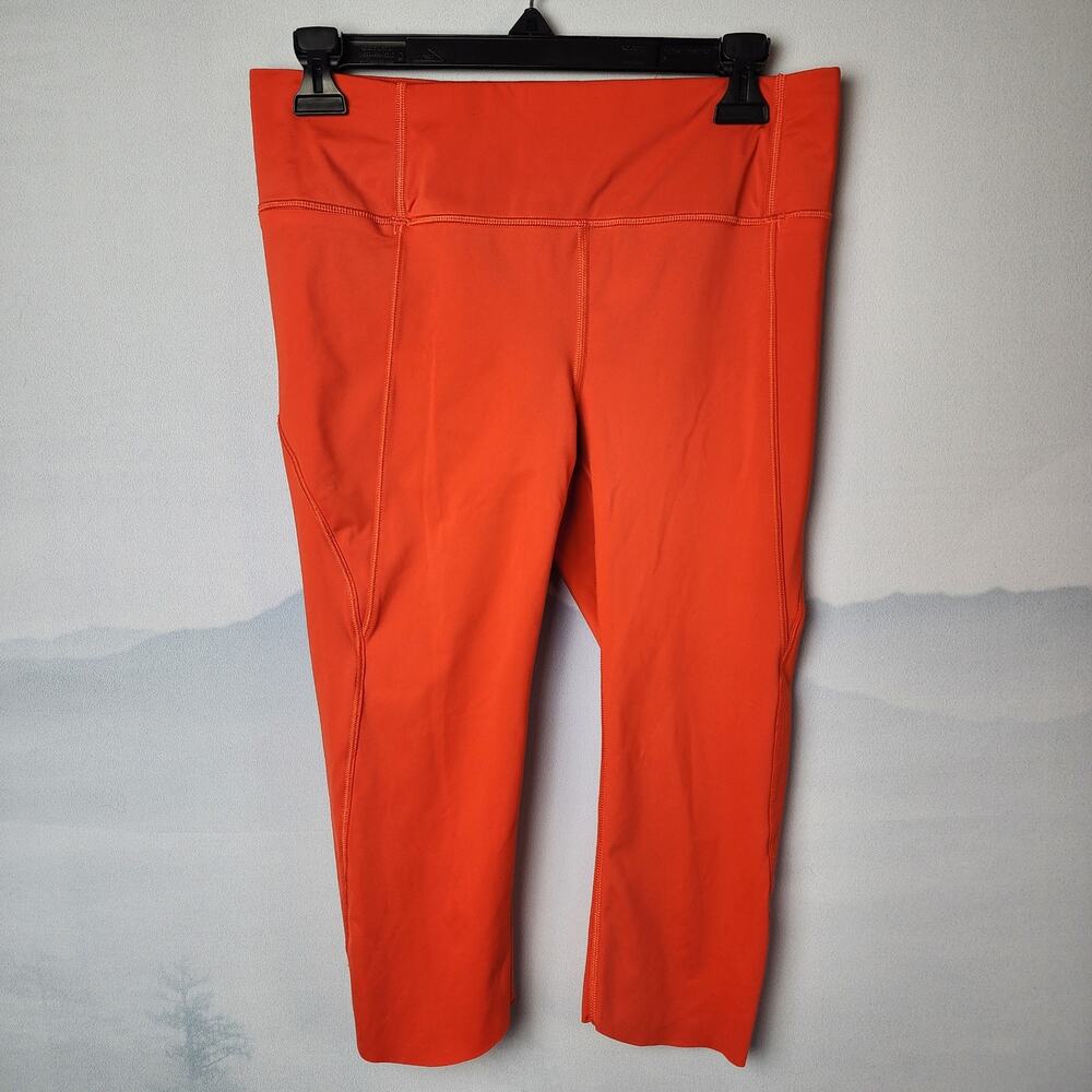 Athleta Neon Orange Lasercut Mid-Rise Cropped Capri Leggings | Women's Small